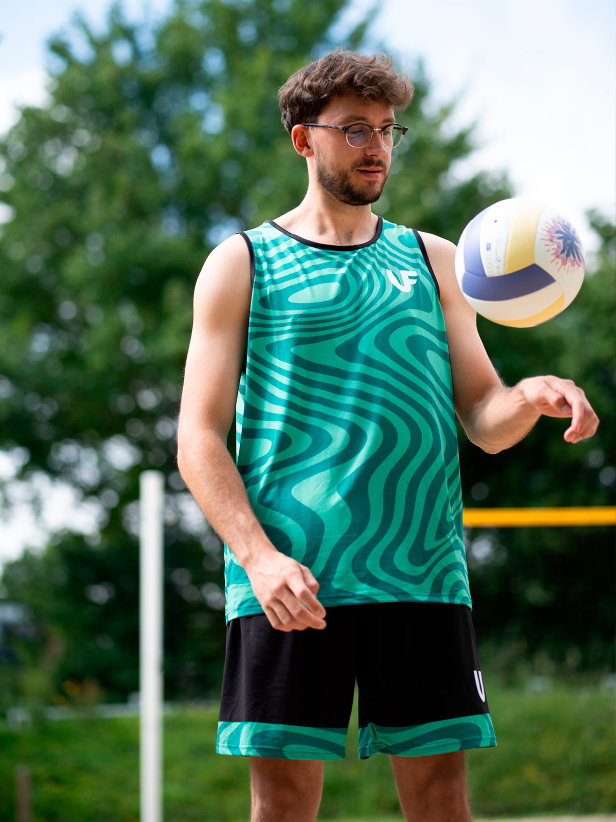 Joueur de volleyball en tenue de sport pour homme coloris vert et noir LVF Break The Lines