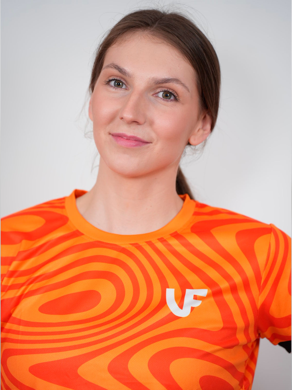 Détail du t-shirt de sport pour femme coloris orange LVF Break The Lines